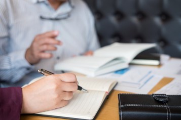 Tutor books with friends, Young students campus or classmates helps friend catching up workbook and learning tutoring in classroom, teaching, learning, People, technology, Education school concept